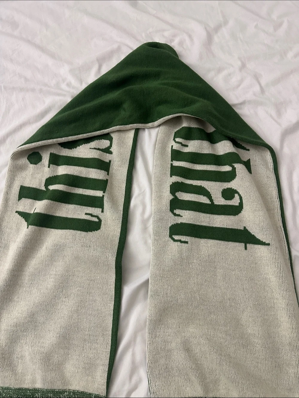 This is never that green beige scarf